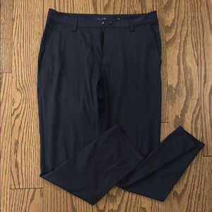 RHONE Blue Dress Pants with Slim Tapered Fit and Structured Fabric